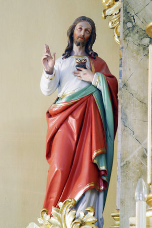 Sacred Heart of Jesus, statue on the altar Our Lady of Sorrows in the parish church of Saints Peter and Paul in Kasina, Croatiaのeditorial素材