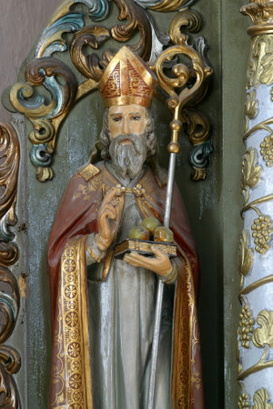 Saint Nicholas, statue on the altar of Saint Anthony the Hermit in the parish church of Saint Peter in Petrovina, Croatiaのeditorial素材