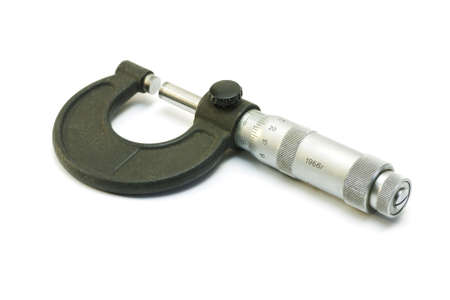 Old micrometer on a white background の写真素材