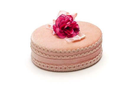 Jewelry box with a flower on a white backgroundの写真素材