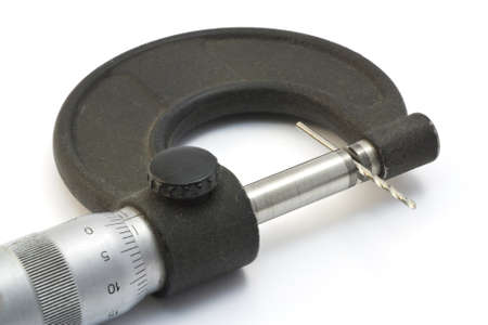 Measure the diameter of the drill bit with a micrometer の写真素材