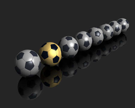 Gold soccer ball among ordinary.の写真素材