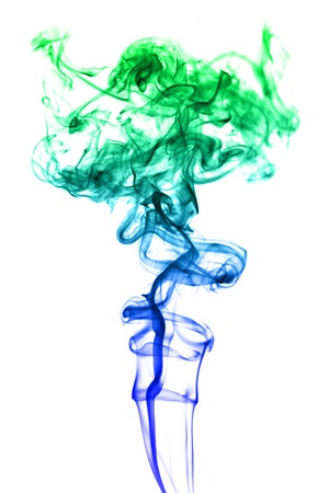 Colored smoke on the white background の写真素材