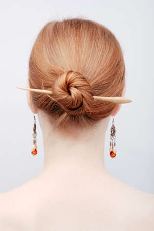 Portrait of the redhead young woman from behindの写真素材