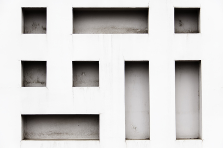 brick wall with little rectangular holes, black and white.の写真素材