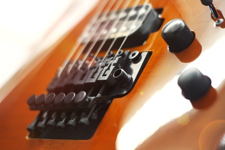 Electric guitar close-up with soft focus of brown color, Floyd Roseの写真素材