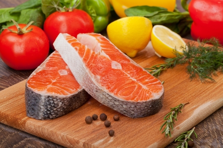 trout fillet with the vegetables  and lemonの写真素材