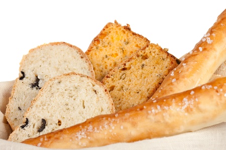  bread in basket isolated on white background の写真素材