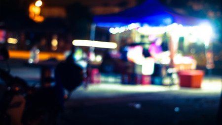 Blur photo of hawker at night.の写真素材