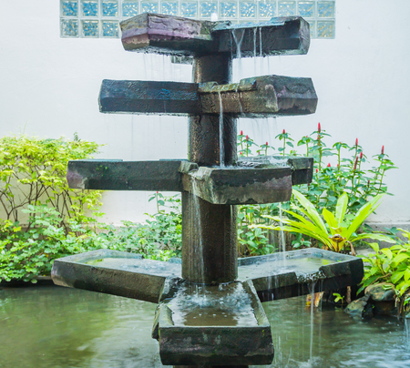 Ornamental stone garden. Water flow.の写真素材