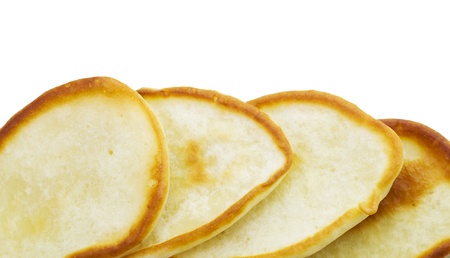 pancakes closeup on a white background
