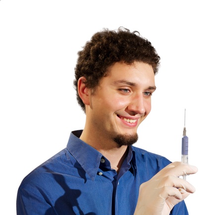 A young man holding a syringe