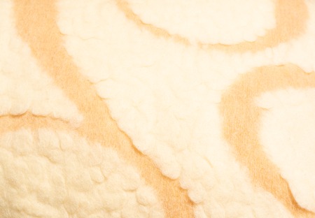 background of warm lamb wool close upの写真素材