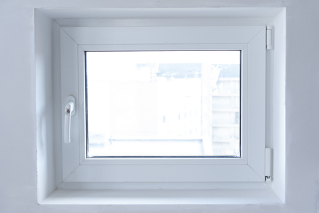 white plastic PVC window indoors close-upの写真素材
