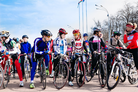 Gomel, Belarus - April 10, 2015: Young girls sportswomen with bicycles talking before the startのeditorial素材