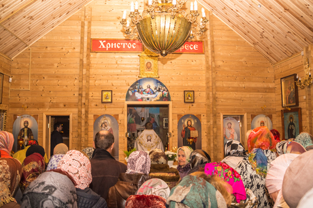 Dobrush, Belarus - May 1, 2016: People listen to an Easter prayer in the churchのeditorial素材