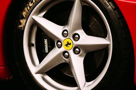 Gomel, Belarus - April 10, 2016: Outer tire on the wheel Michelin car Ferrari logoのeditorial素材