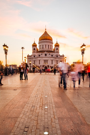 Patriarchal bridge with people blurring. Christ the Savior Cathedral at sunsetの写真素材