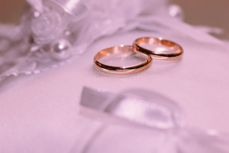 Beautiful wedding gold ringsの写真素材