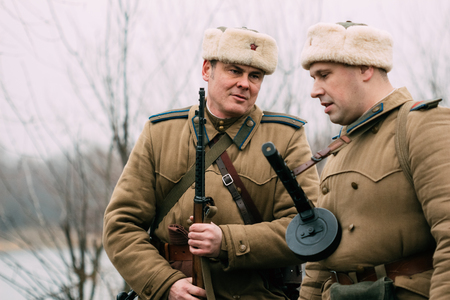 Officers of the Red Army with weapons talking to each other. Gomのeditorial素材