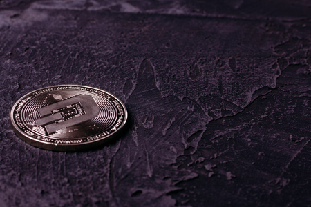 Dash metal cryptate on a concrete surfaceの写真素材