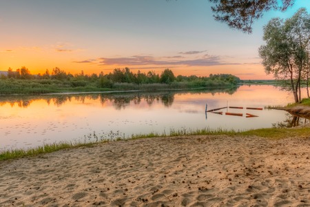 River in summer at sunset beach wildの写真素材