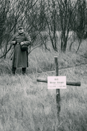 A German soldier in his greatcoat of the Second World War is staのeditorial素材