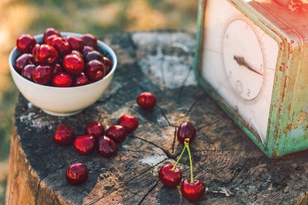 Beautiful background with cherry and old weightsの写真素材