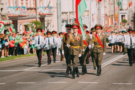 Gomel, Belarus - May 9, 2018: A guard of honor with a banner walks along a Soviet street in Gomel on Victory Day May 9のeditorial素材