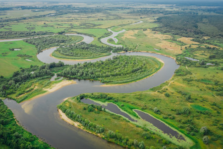Picturesque flat landscape with a winding river. Aerial viewの写真素材
