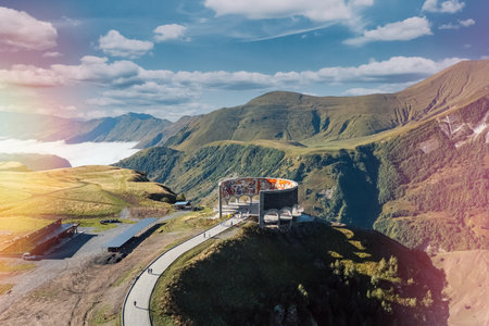 Monument of friendship of nations in Georgia. Stunning aerial view of a unique mountain structure overlooking a breathtaking landscapeの写真素材
