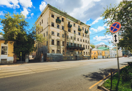 An Urban Landscape showcasing a Historic Building alongside a prominent Street Sign in the cityの写真素材