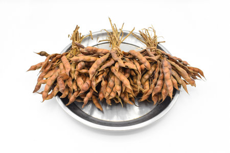Myanmar or Burmese traditional street food, boiled pea bunches. Isolated on white background. Front view.の写真素材