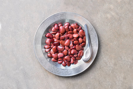 Boiled red flat beans. Protein rich food. Healthy diet menu. Closeup view.