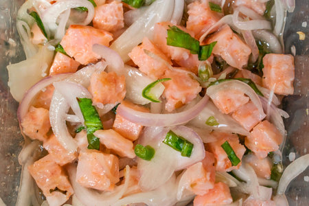 salmon salad with onion and chives, closeup of photoの写真素材