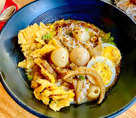 Myanmar traditional or classic white rice noodle fish soup called mohingaの写真素材