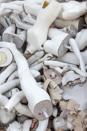 A pile of abandoned old mannequinsの写真素材