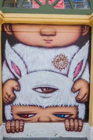 A mural artwork of an iconic character 'Mardi', a kid in a bunny outfit by Alex Face in Phuket, Thailand, a famous Thai street artist.のeditorial素材