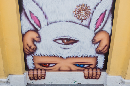 A mural artwork of an iconic character 'Mardi', a kid in a bunny outfit by Alex Face in Phuket, Thailand, a famous Thai street artist.のeditorial素材
