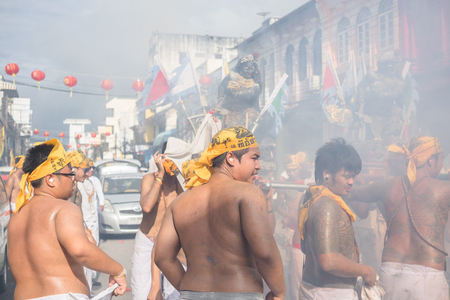 Phuket, Thailand : - October 5, 2016: A Taoist devotee participates in the Phuket Vegetarian Festival. The festival ritual mortification is practiced to appease the Gods.のeditorial素材