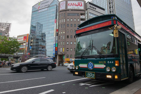Kobe, Japan - April 23, 2016: City loop bus is a popular bus route for tourist. in Kobe, Japanのeditorial素材