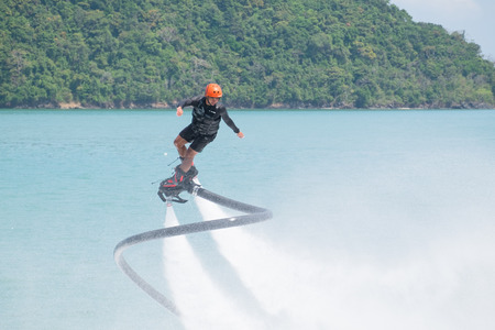 Phuket, Thailand - January 14, 2017: Showing flyboard on Ao Makham during Children's day in Phuket, Thailandのeditorial素材
