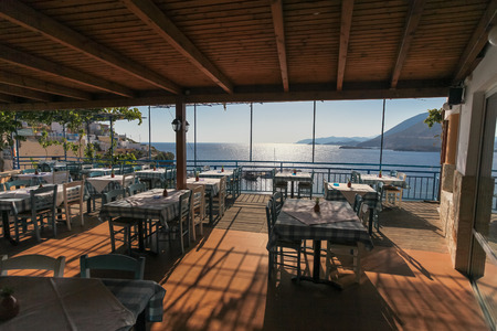 Restaurant with view on the sea and mountains. Fish Village Bali on Crete island in Greece.のeditorial素材