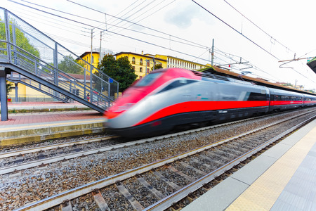 Florence, ITALY- September 10, 2016: Speed train TrenItalia in motion on the station in Florence...