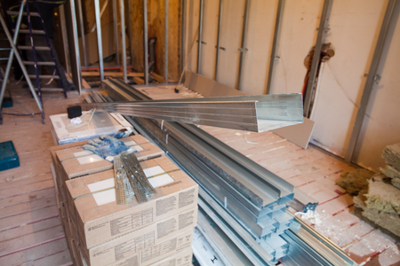 Interior of apartment during on the renovation and construction ( making wall from gypsum plasterboard)の写真素材