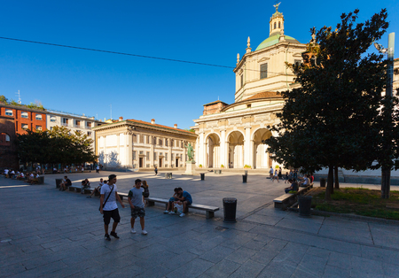 MILAN, ITALY - September 12, 2016: Tourists and local people are walking near The Basilica of San Lorenzo Maggiore the statue of Emperor Constantine. The Basilica of San Lorenzo Maggiore is one of the oldest churches in the city.のeditorial素材