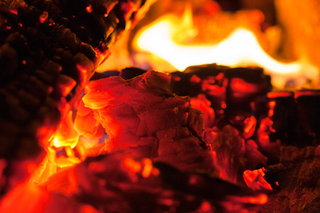 Very hot charcoal and firewood burning in in the fireplaceの写真素材