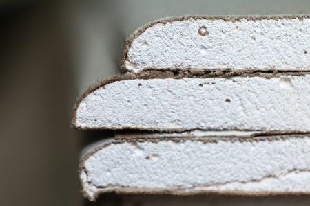 Sheets of plasterboard or drywall (close up)  in an apartment during on the construction,...