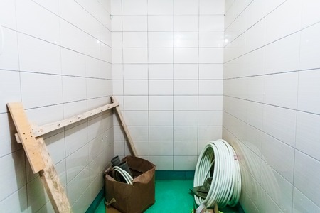 Materials for plumbing for repairs bathroom fixtures or bathroom fitment in room with tile an apartment is under construction, remodeling, rebuilding and renovation.の写真素材