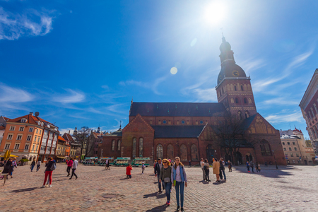 RIGA, LATVIA - MAY 06, 2017: View on Riga Cathedral is the Evangelical Lutheran cathedral and Dome Square with street cafes that are  located in the city center of Riga.のeditorial素材